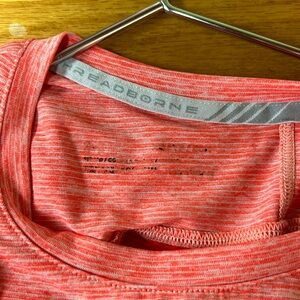 Under Armour brand top, size XS, color orange